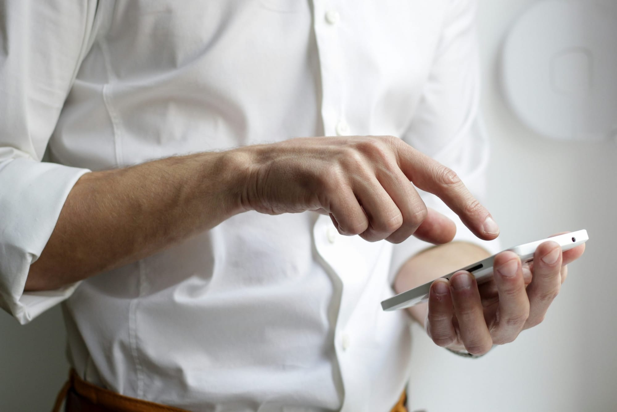 phone in hand scaled